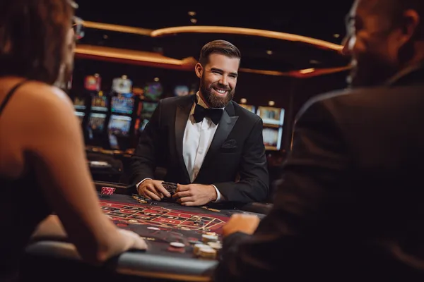 A young woman relaxing with her phone while dynamic casino elements float around her, illustrating the smooth mobile experience offered by the ZEUS75 app.