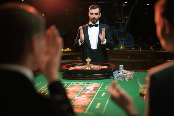 A glamorous woman holding casino chips in a neon-lit environment, representing the premium online casino atmosphere of ZEUS75.