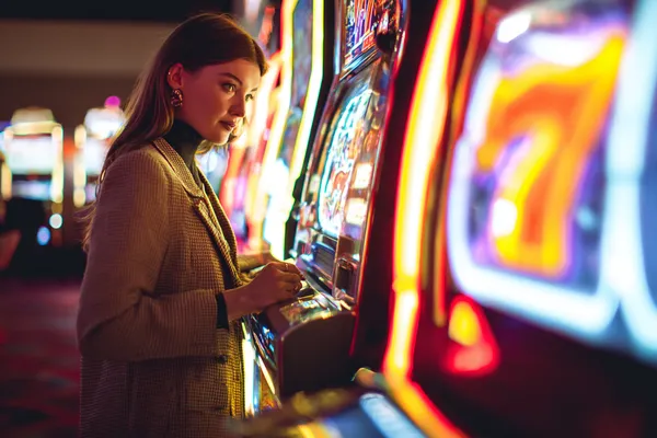 A vibrant slot machine bursting with lights and winning icons, highlighting the thrill of ZEUS75’s top-rated slot titles.